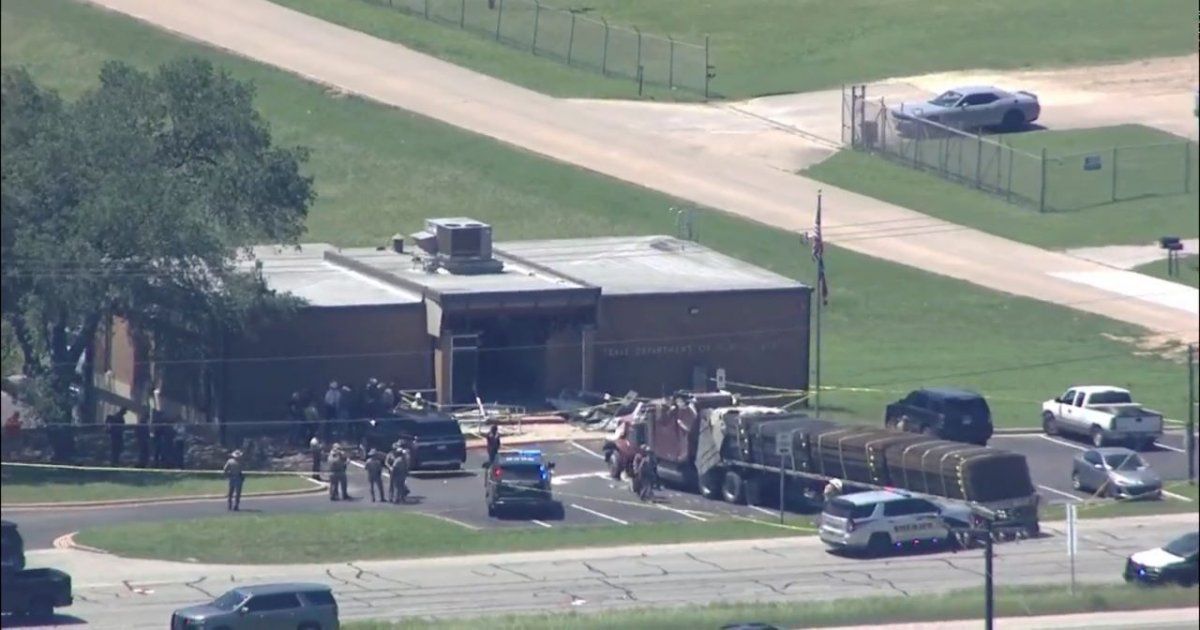 Man crashes truck into public security office;  1 dead and 13 injured