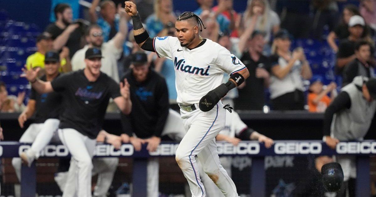 Marlins complete sweep of Rockies with victory in extra innings