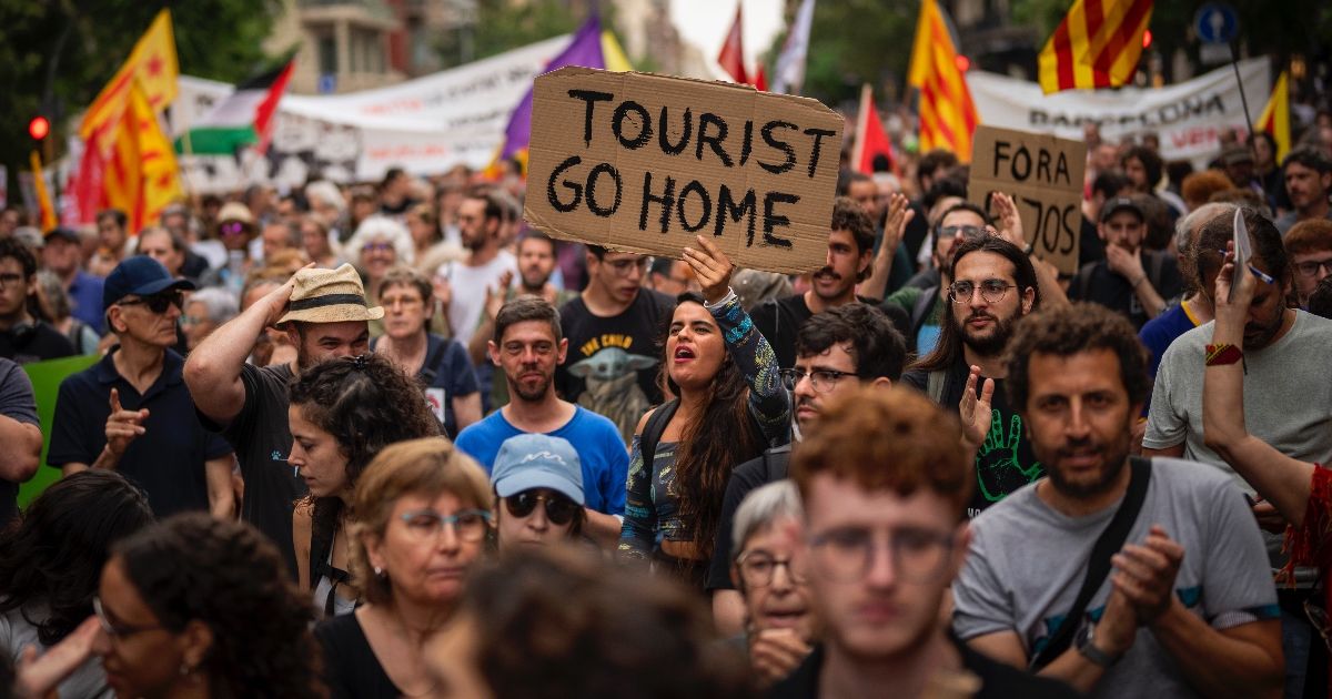 Spain expects record number of visitors amid protests: 'Tourists, go home'